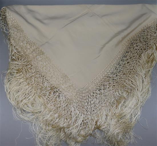 A 1920s fringed silk shawl in lacquered box